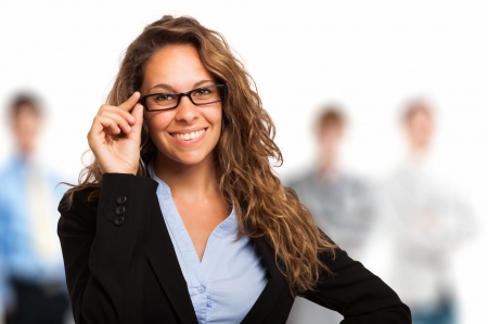 Woman holding her eyeglasses